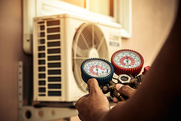 Professional Heat Pump Repair technician working in Grammer, IN